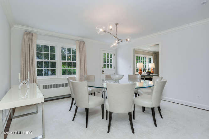 110 Meadow Road Riverside, CT 06878 - Photo 10 of 38 a dining room with furniture window and wooden floor