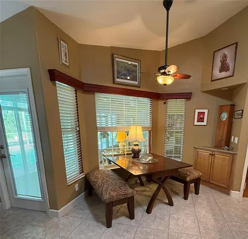 a view of a livingroom with furniture and window