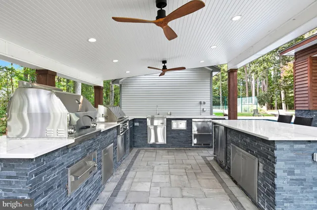 a view of a dining room with furniture and window