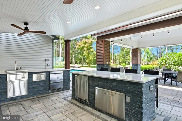 a kitchen that has a stove and a microwave