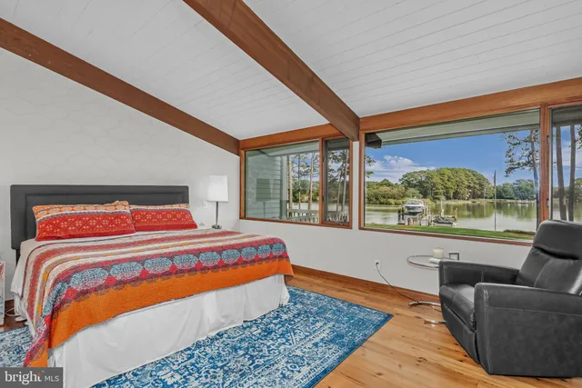 an aerial view of a city and lake view