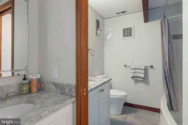 a view of a lake with a yard