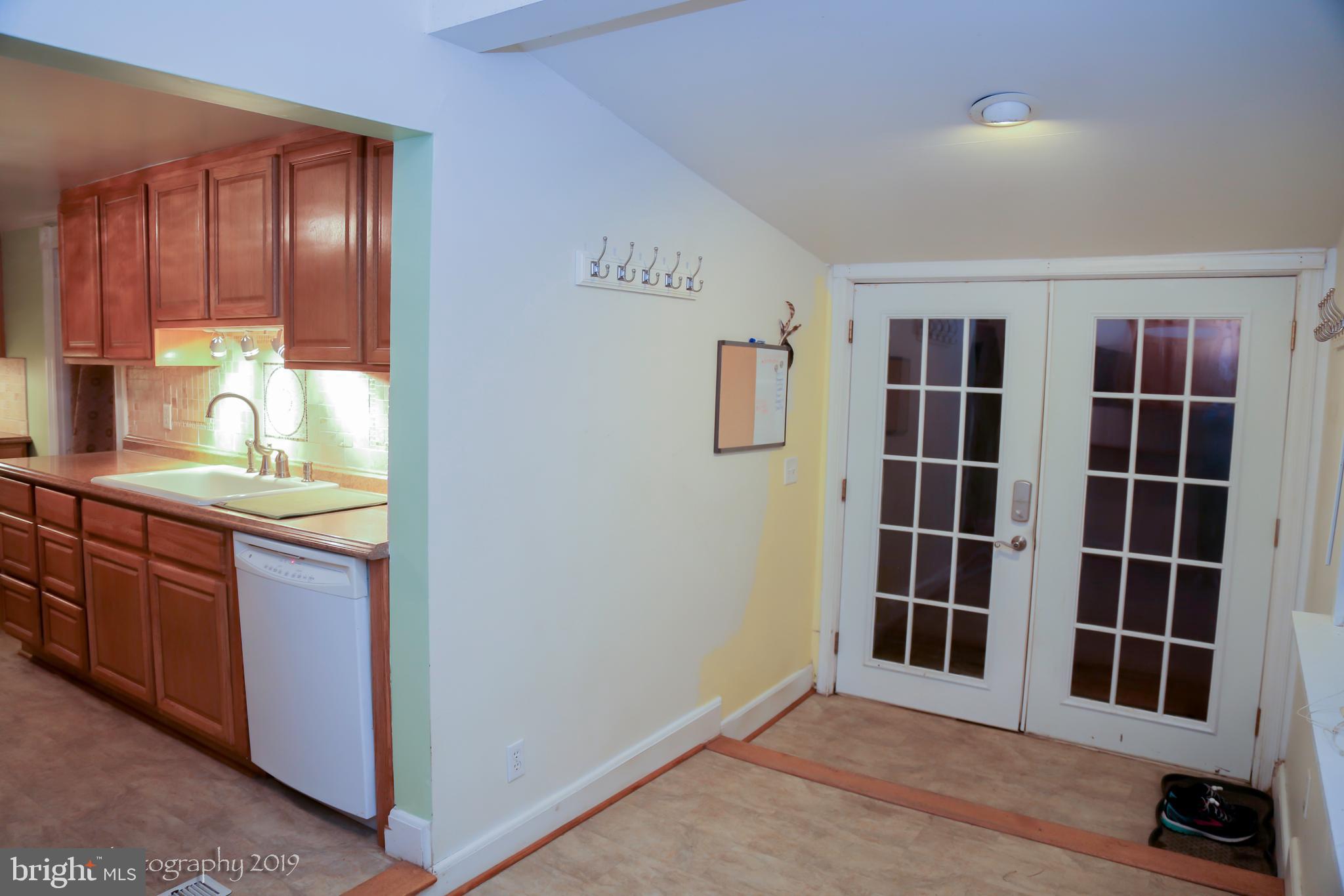 16873 Henderson Road Henderson, MD 21640 - Photo 12 of 45 Perspective shot of Back Door to Kitchen