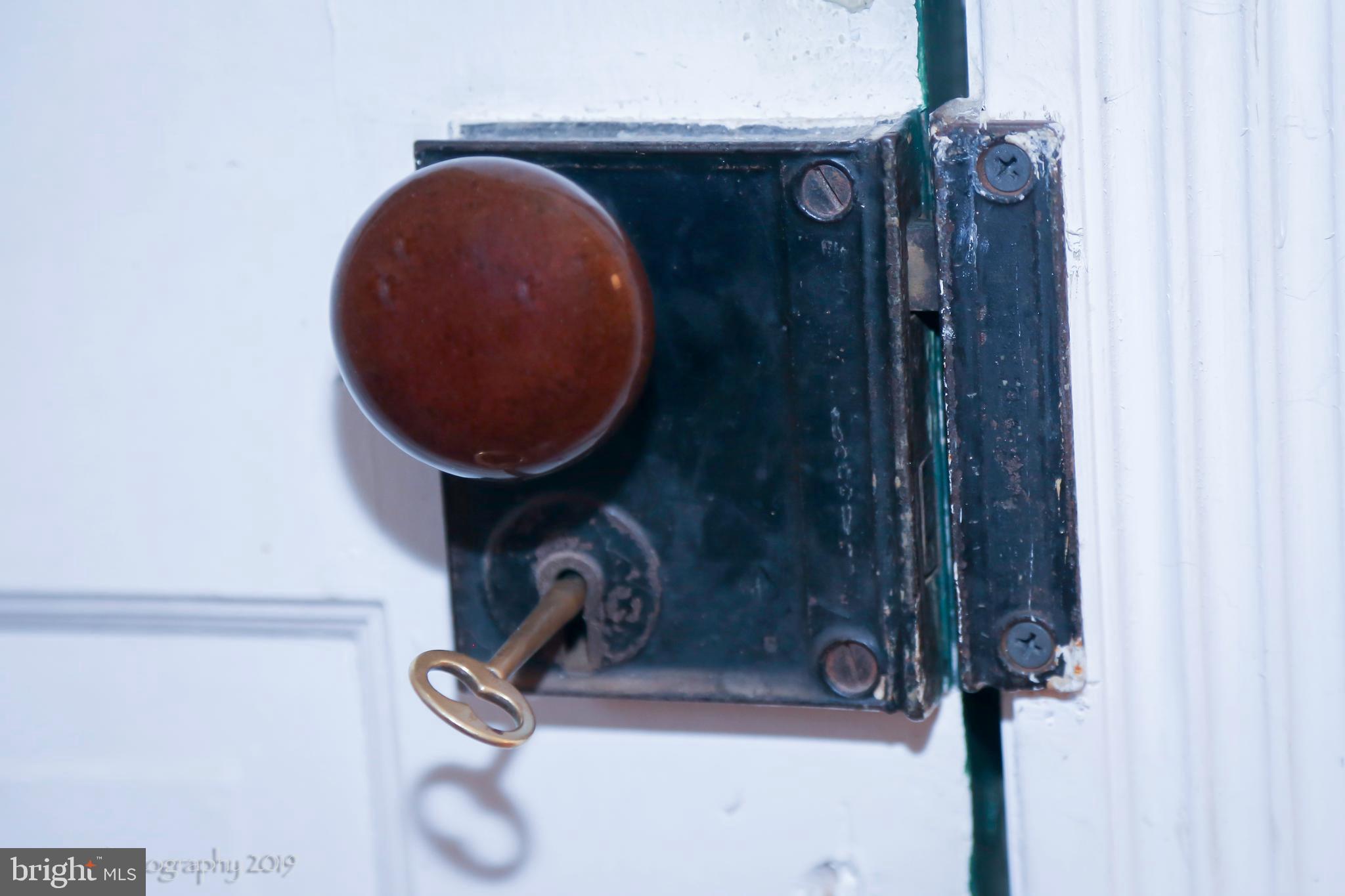 16873 Henderson Road Henderson, MD 21640 - Photo 24 of 45 Original front door lock and knob with working key