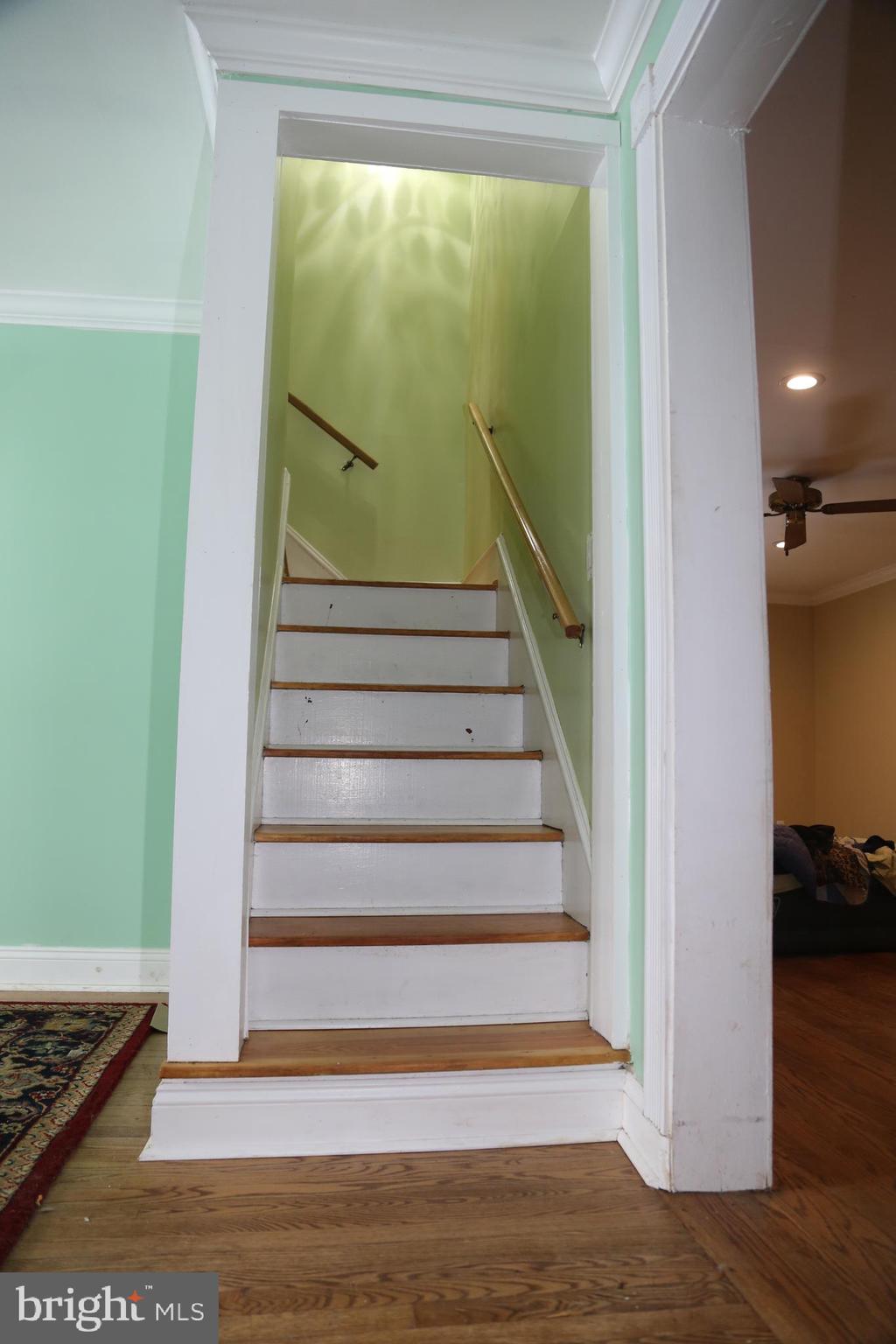 16873 Henderson Road Henderson, MD 21640 - Photo 25 of 45 Original hardwood stairs