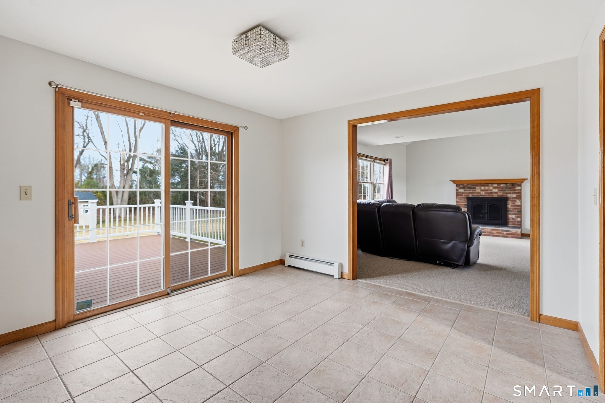 36 Cardinal Way South Windsor, CT 06074 - Photo 12 of 40 a living room with furniture and a large window