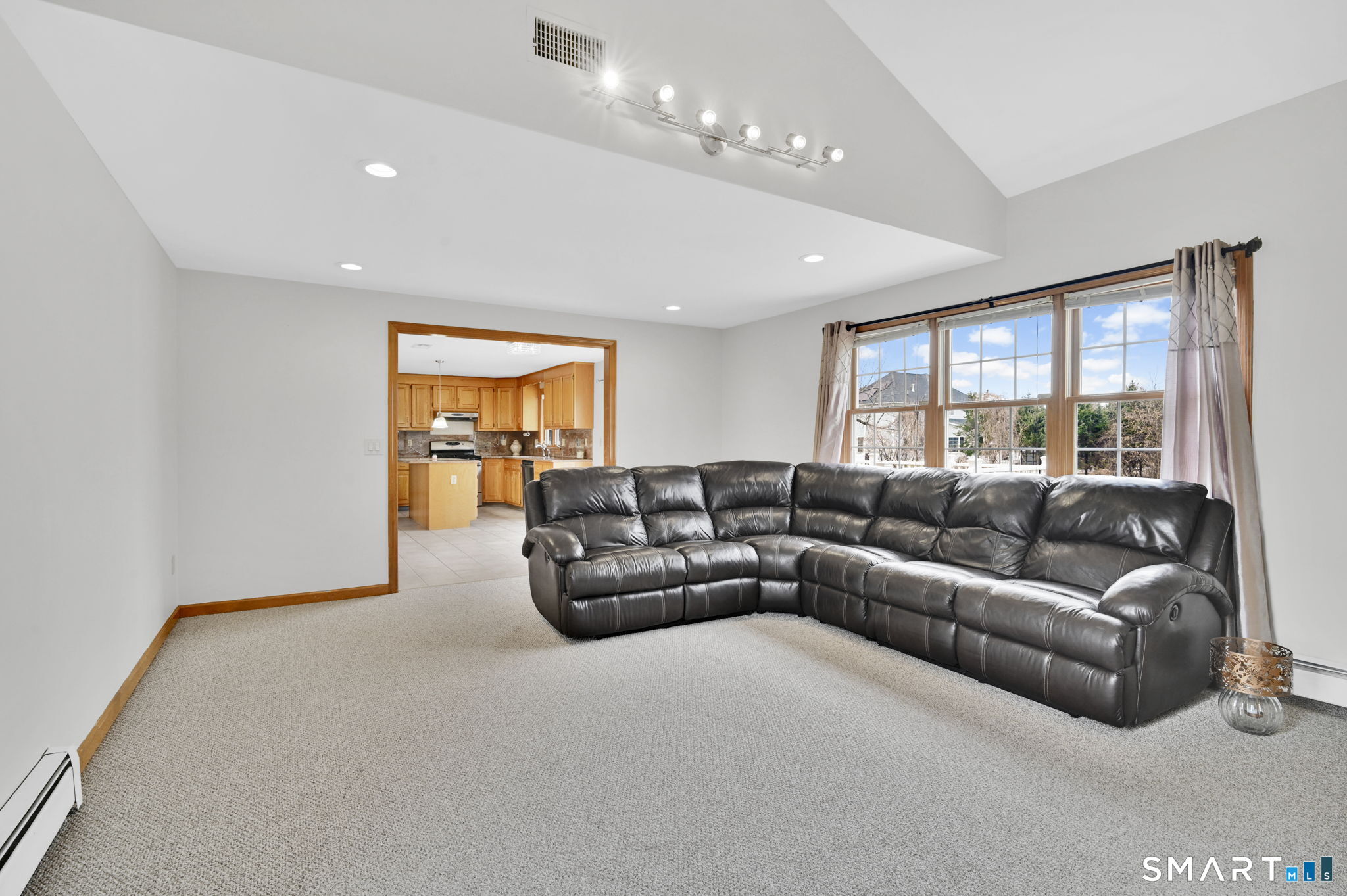 36 Cardinal Way South Windsor, CT 06074 - Photo 14 of 40 a living room with furniture and a large window