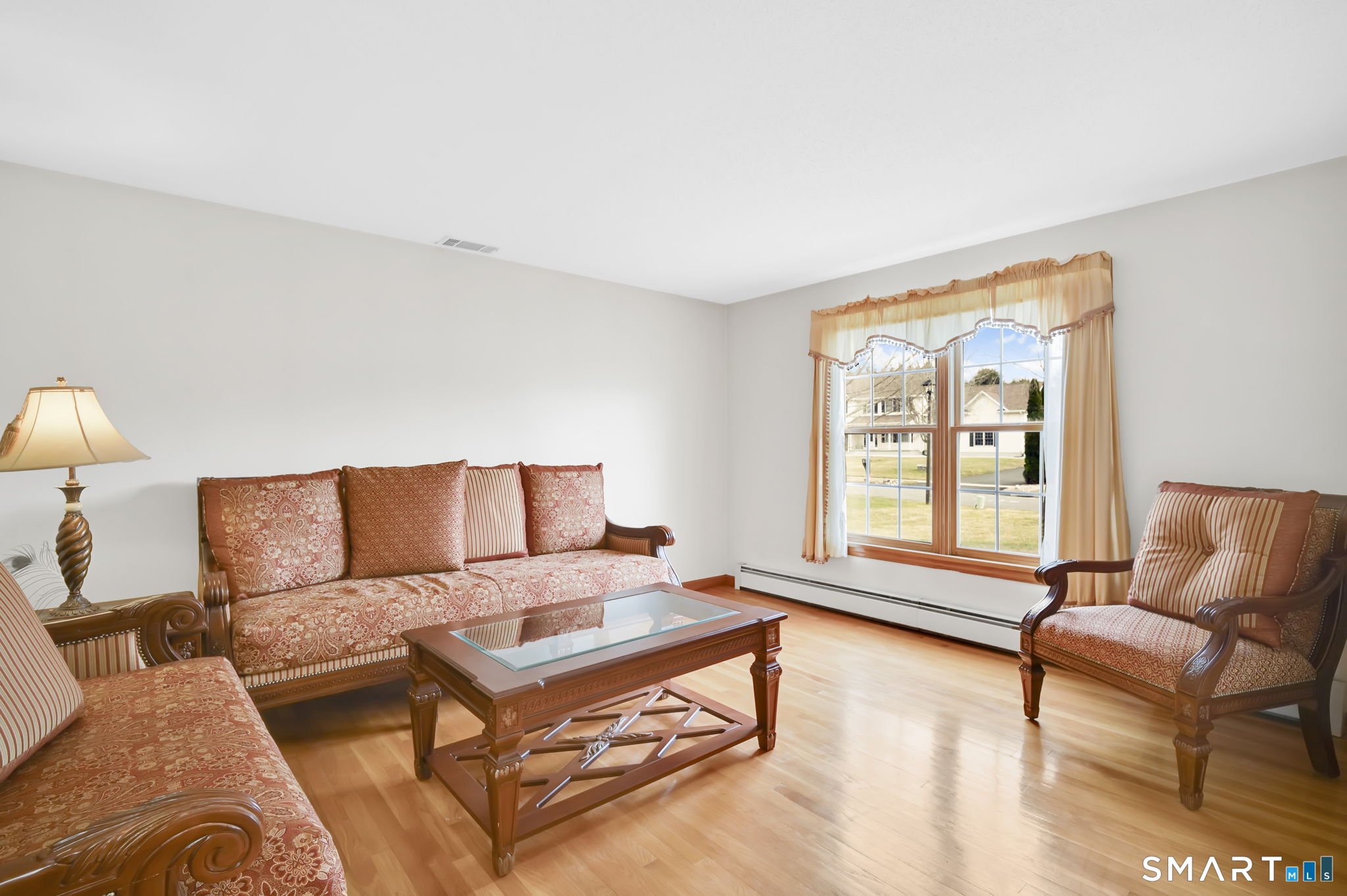 36 Cardinal Way South Windsor, CT 06074 - Photo 17 of 40 a living room with furniture and a window