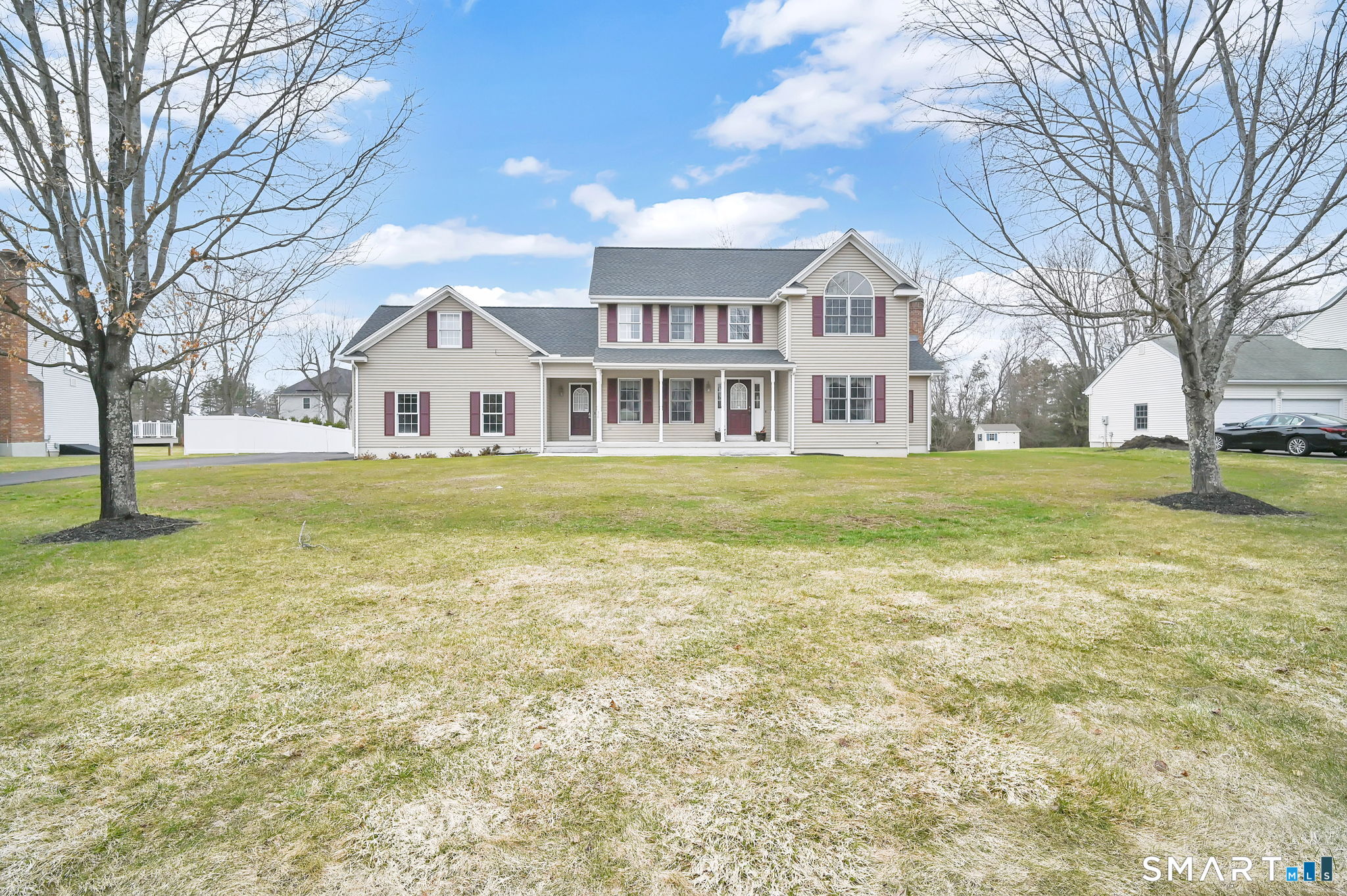 36 Cardinal Way South Windsor, CT 06074 - Photo 2 of 40 a front view of a building with a yard