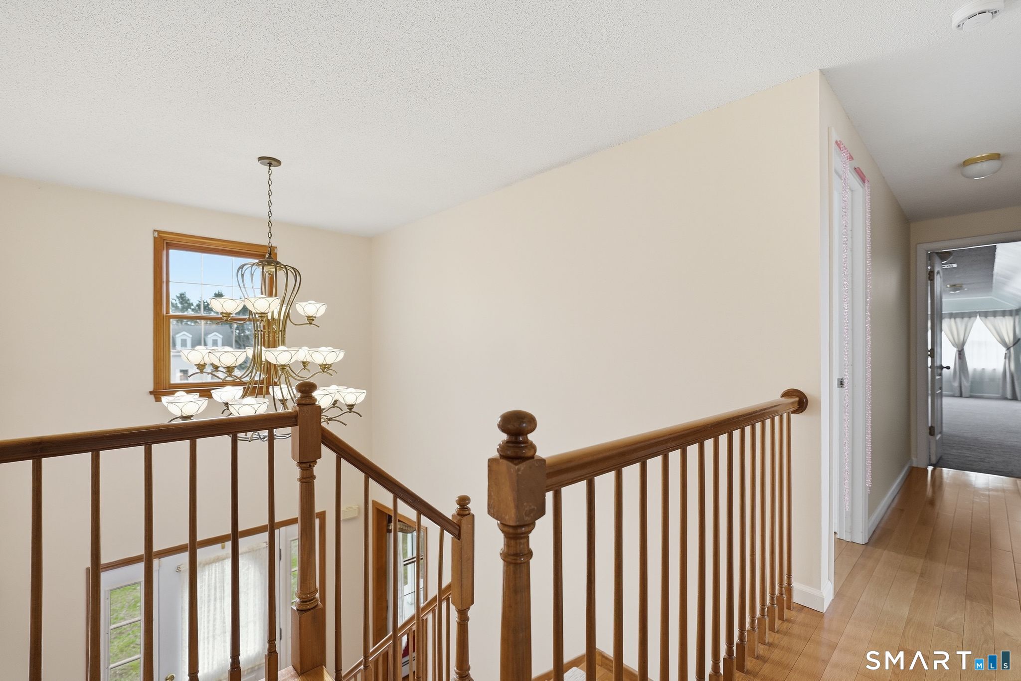 36 Cardinal Way South Windsor, CT 06074 - Photo 22 of 40 a view of a hallway with windows