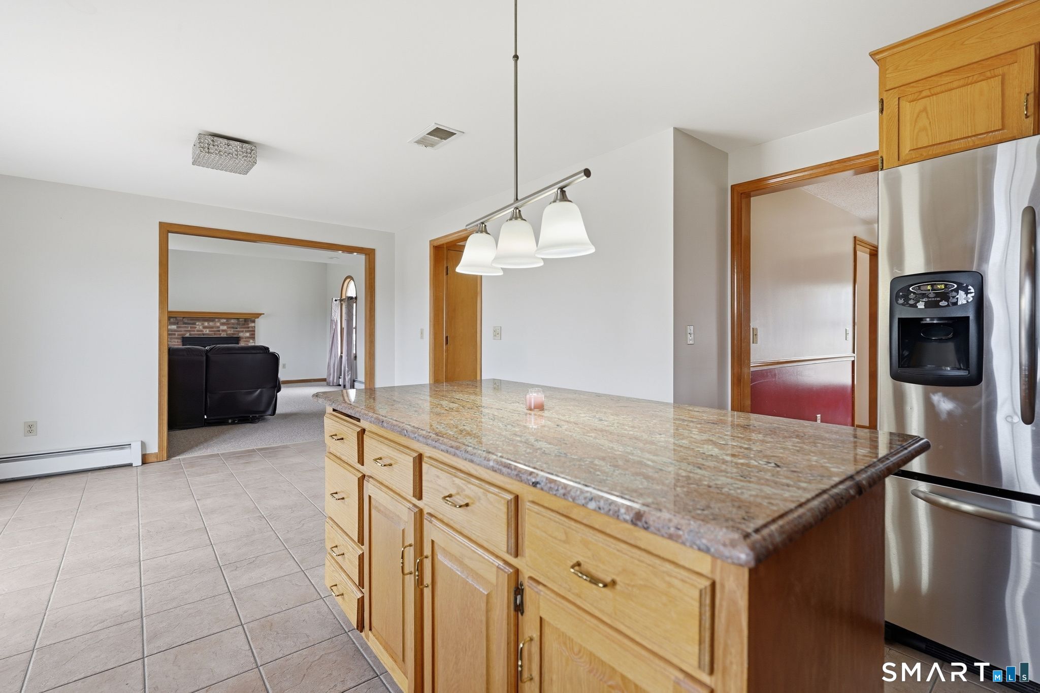 36 Cardinal Way South Windsor, CT 06074 - Photo 10 of 40 a kitchen with stainless steel appliances granite countertop a sink refrigerator and cabinets
