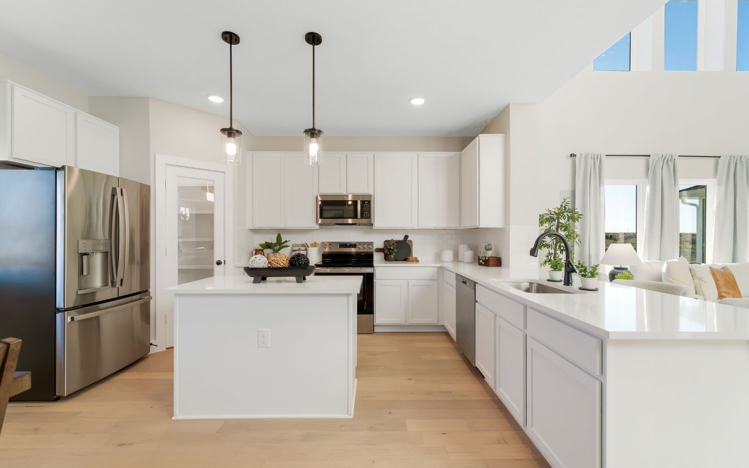 7224 Fairlawn Drive Fairview, TN 37062 - Photo 7 of 25 a kitchen with kitchen island a counter top space a sink stainless steel appliances and cabinets