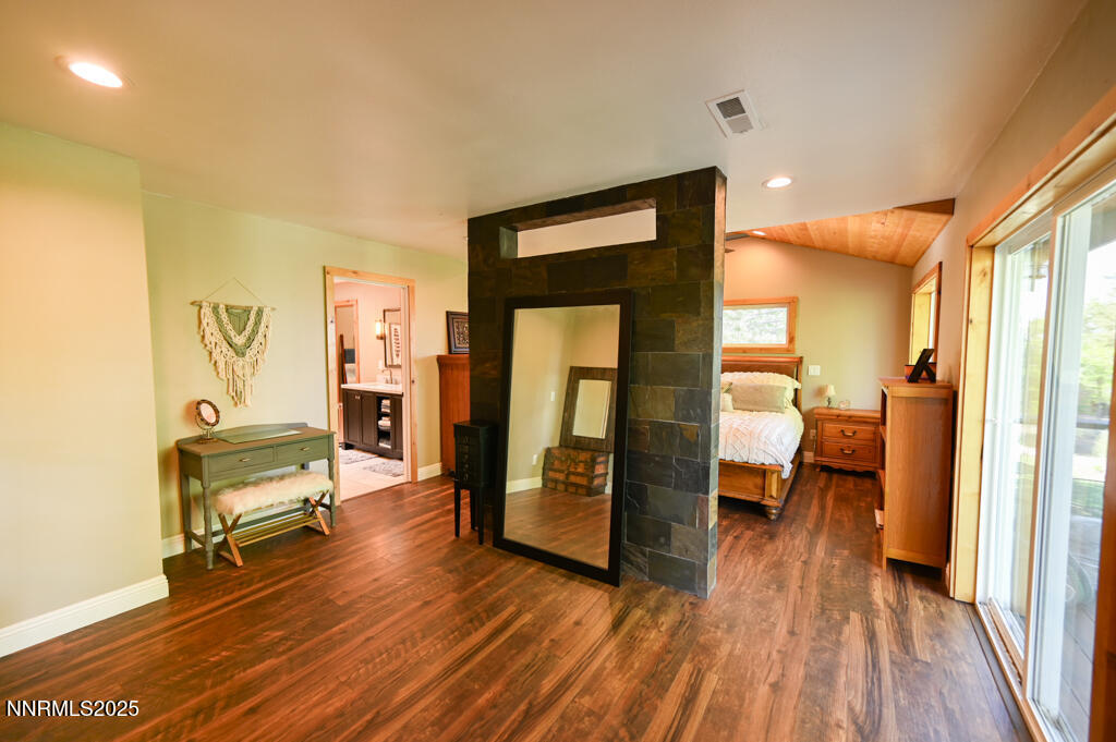 1147 Autumn Hills Road Gardnerville, NV 89460 - Photo 23 of 50 a living room with furniture and a wooden floor