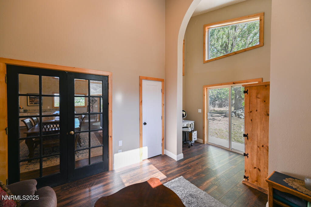 1147 Autumn Hills Road Gardnerville, NV 89460 - Photo 10 of 50 a empty room with wooden floor and furniture