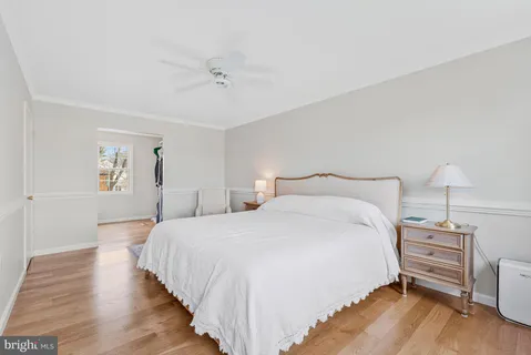 a bedroom with a bed and a closet