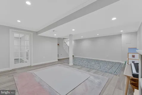 a view of a livingroom with wooden floor