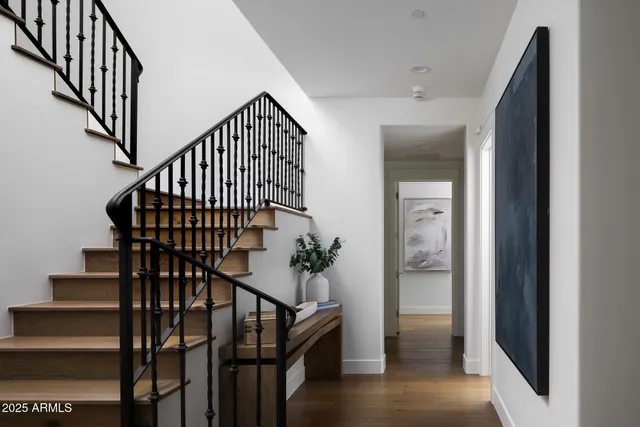 a view of entryway with wooden floor