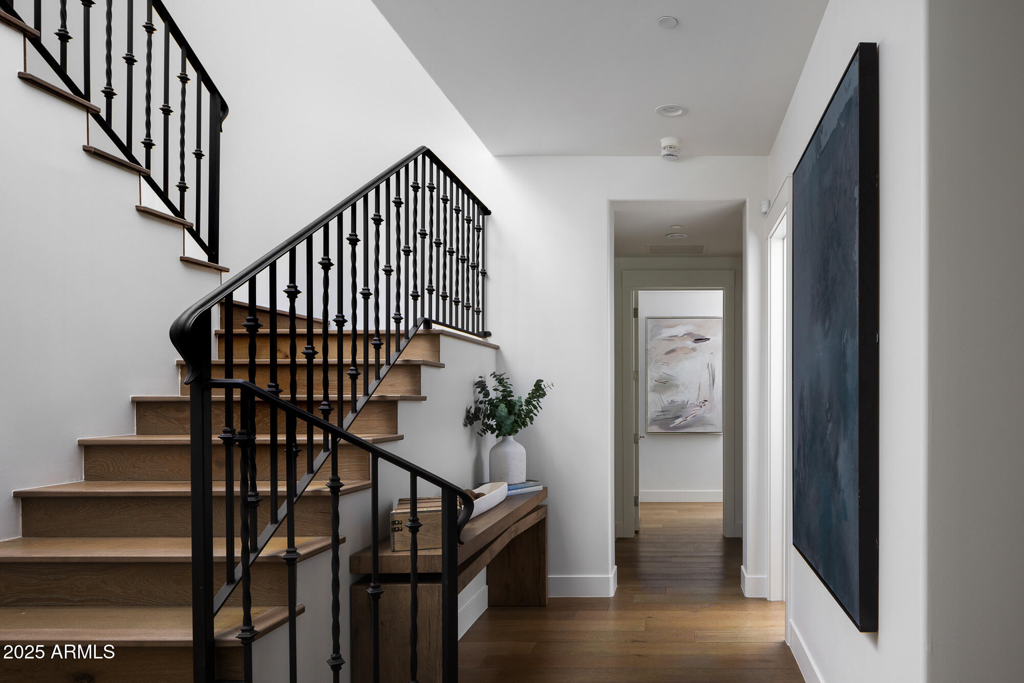 7730 North Mockingbird Lane Paradise Valley, AZ 85253 - Photo 15 of 42 a view of entryway with wooden floor