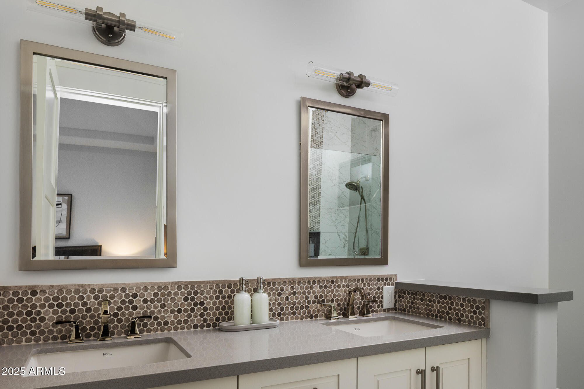 7730 North Mockingbird Lane Paradise Valley, AZ 85253 - Photo 26 of 42 a bathroom with a sink and a mirror