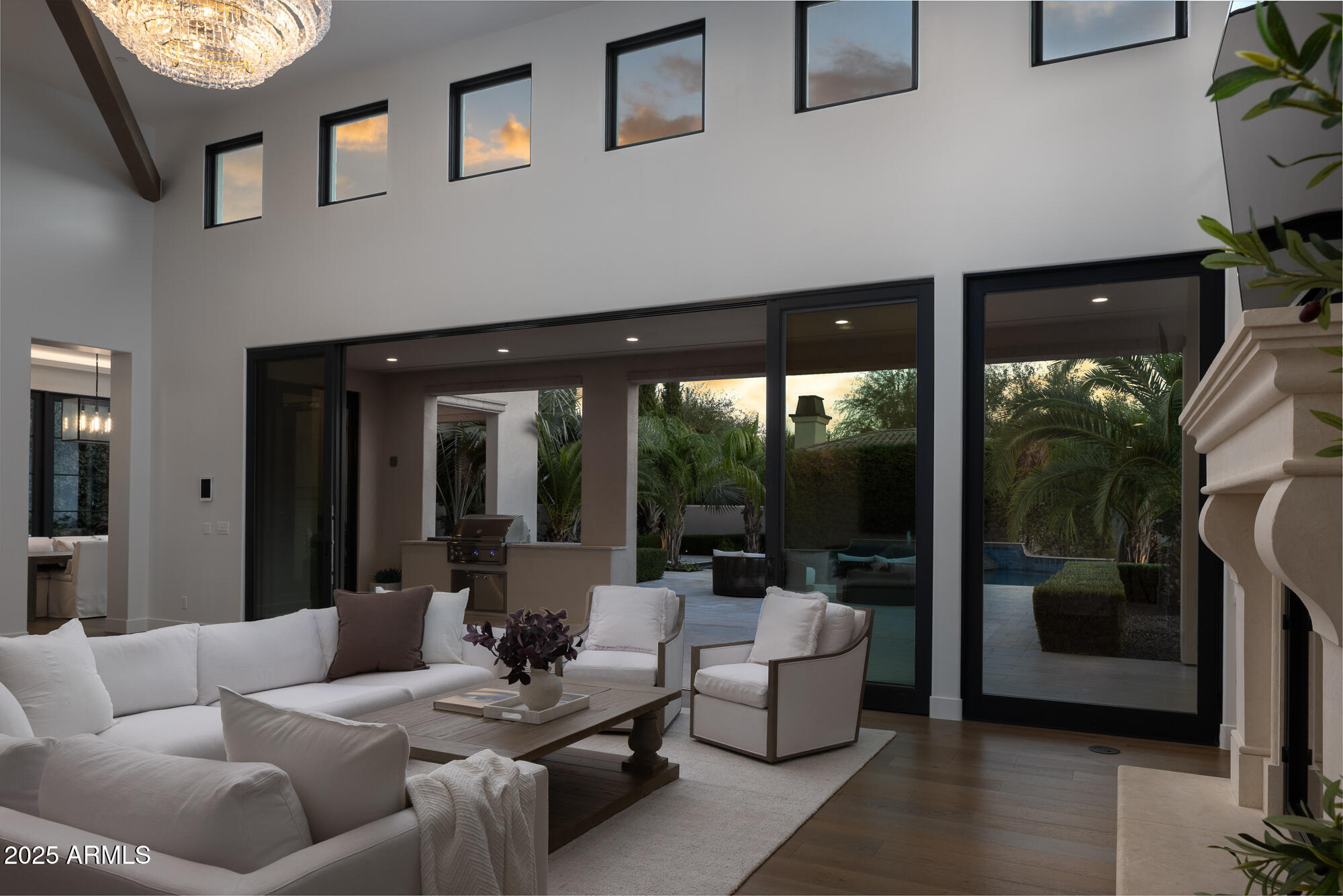 7730 North Mockingbird Lane Paradise Valley, AZ 85253 - Photo 3 of 42 a living room with furniture and a large window