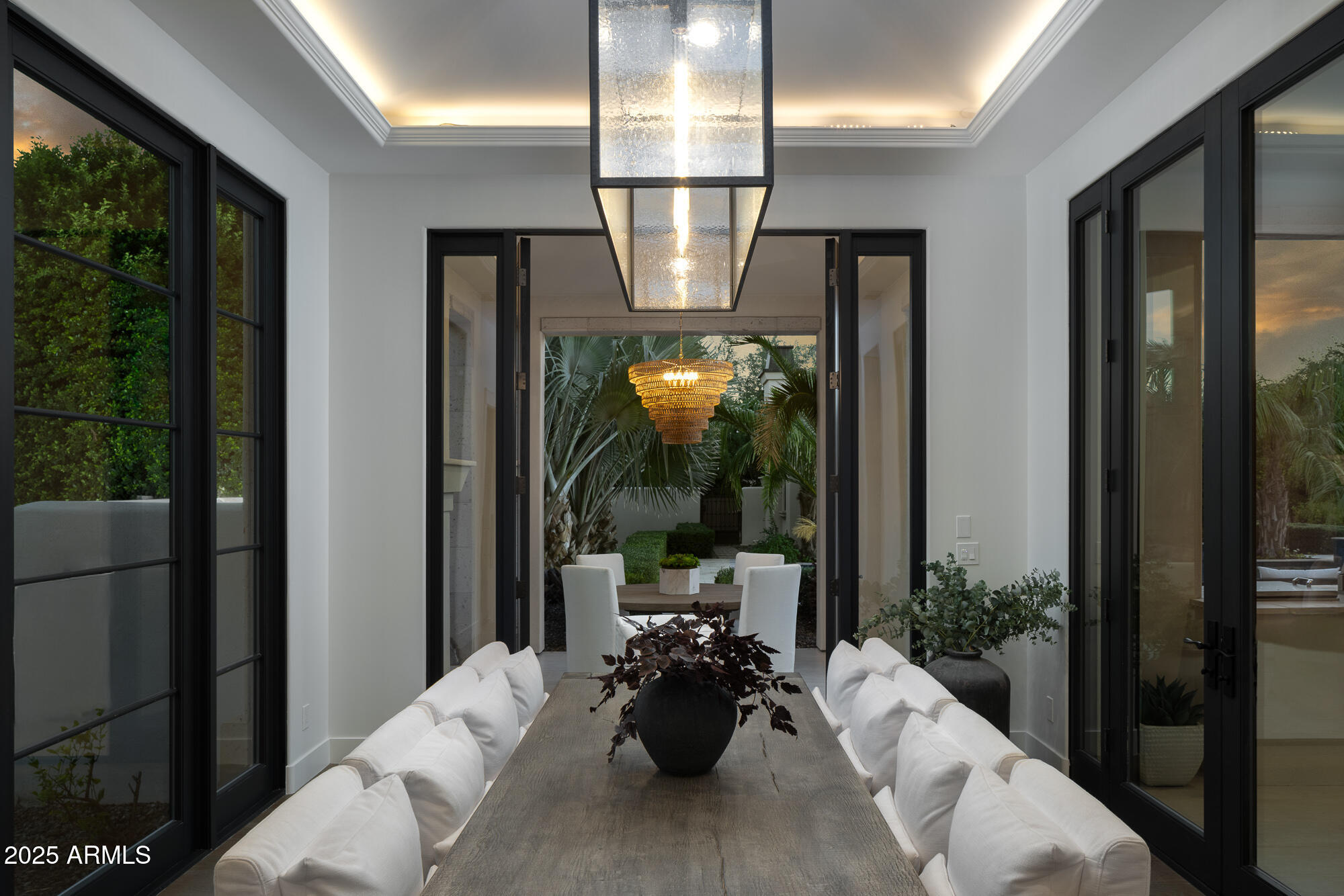 7730 North Mockingbird Lane Paradise Valley, AZ 85253 - Photo 37 of 42 a living room with furniture and a potted plant