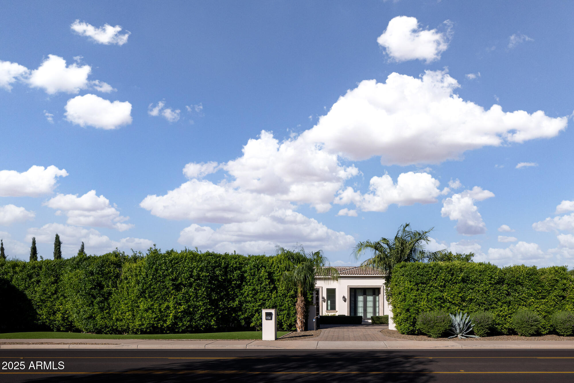 7730 North Mockingbird Lane Paradise Valley, AZ 85253 - Photo 42 of 42 a view of a house with a yard