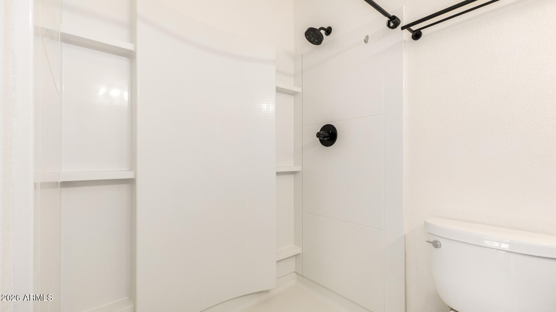 1149 East Rovey Avenue Phoenix, AZ 85014 - Photo 17 of 25 a bathroom with a shower