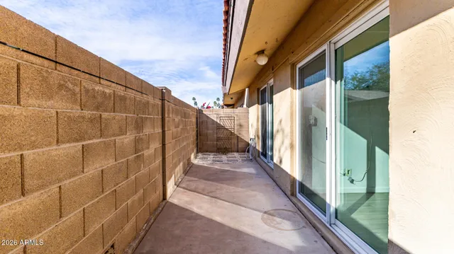 a view of a house with a street