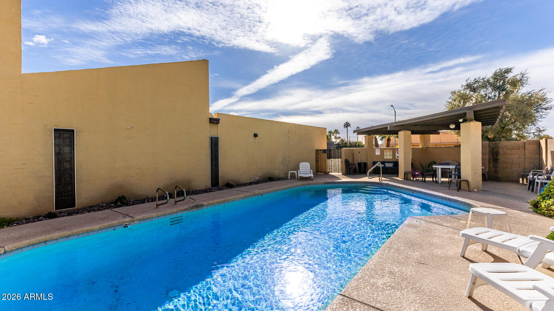 1149 East Rovey Avenue Phoenix, AZ 85014 - Photo 25 of 25 a view of swimming pool with seating area
