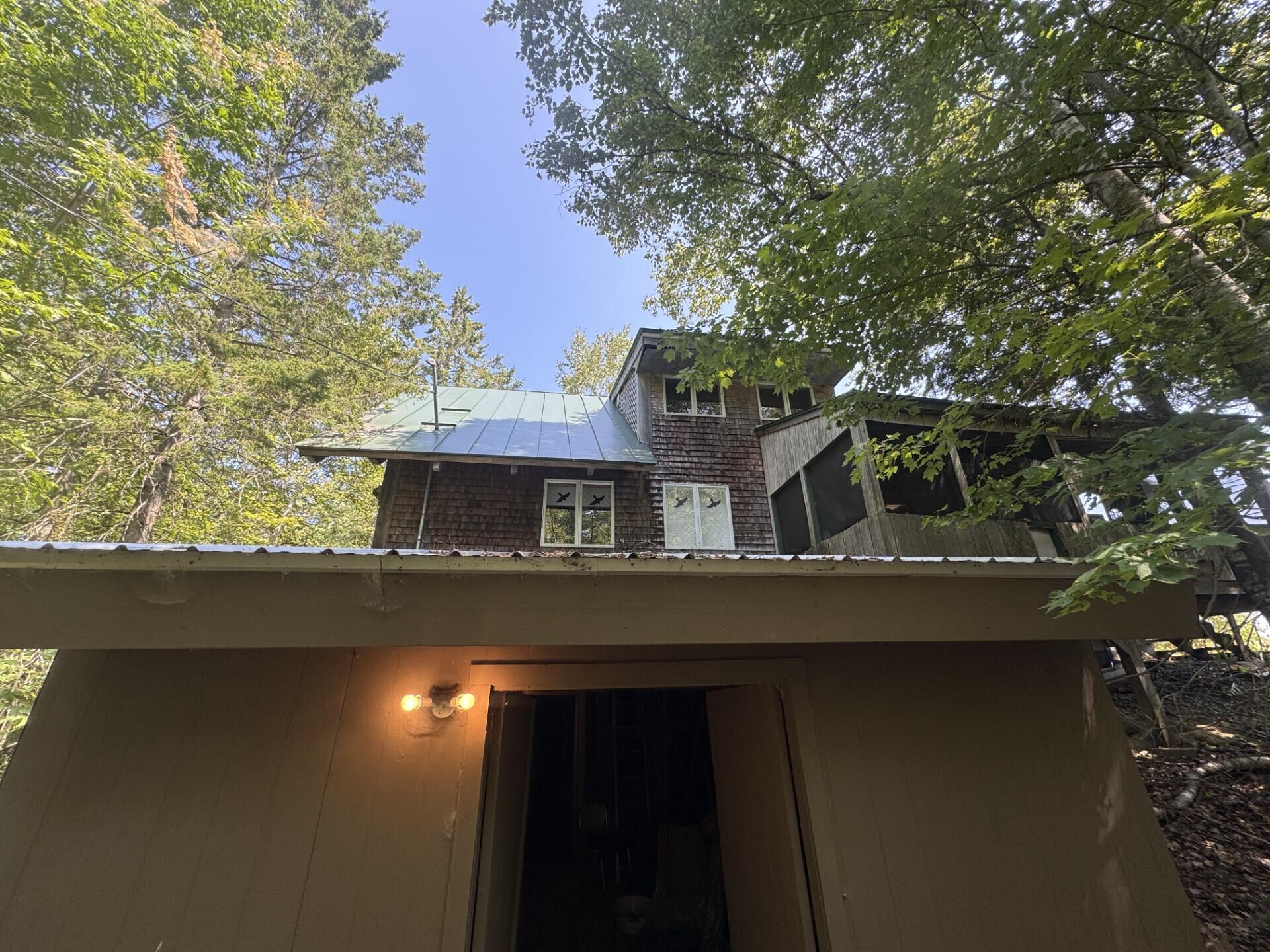 256 Waning Road Unity, ME 04988 - Photo 17 of 17 Walkout & woodshed