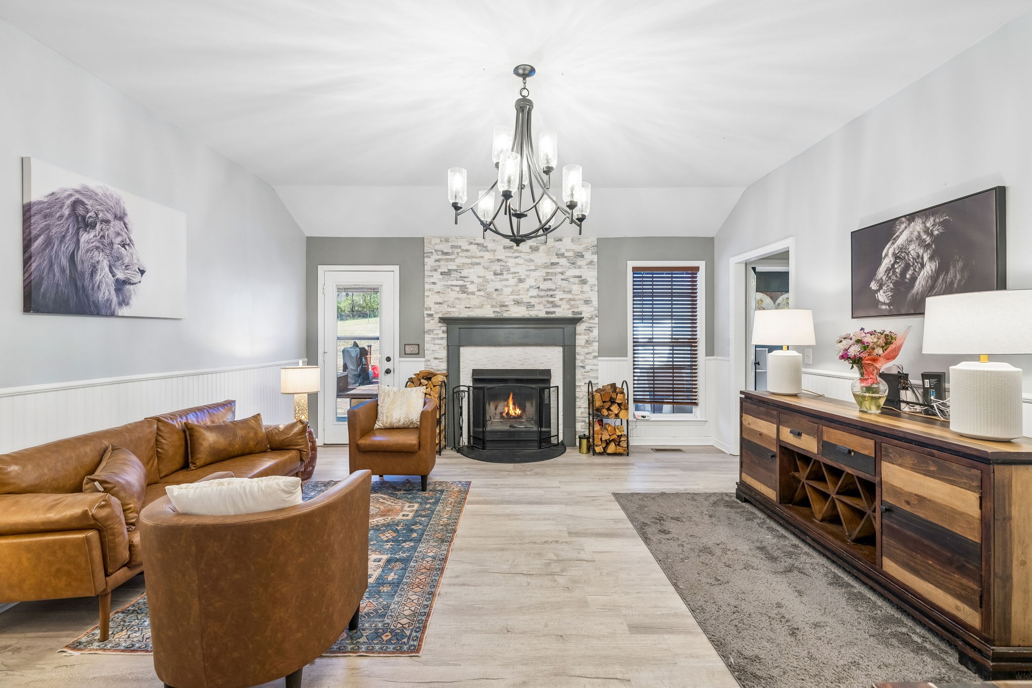 1245 Cliff Amos Road Spring Hill, TN 37174 - Photo 11 of 41 a living room with furniture and a fireplace
