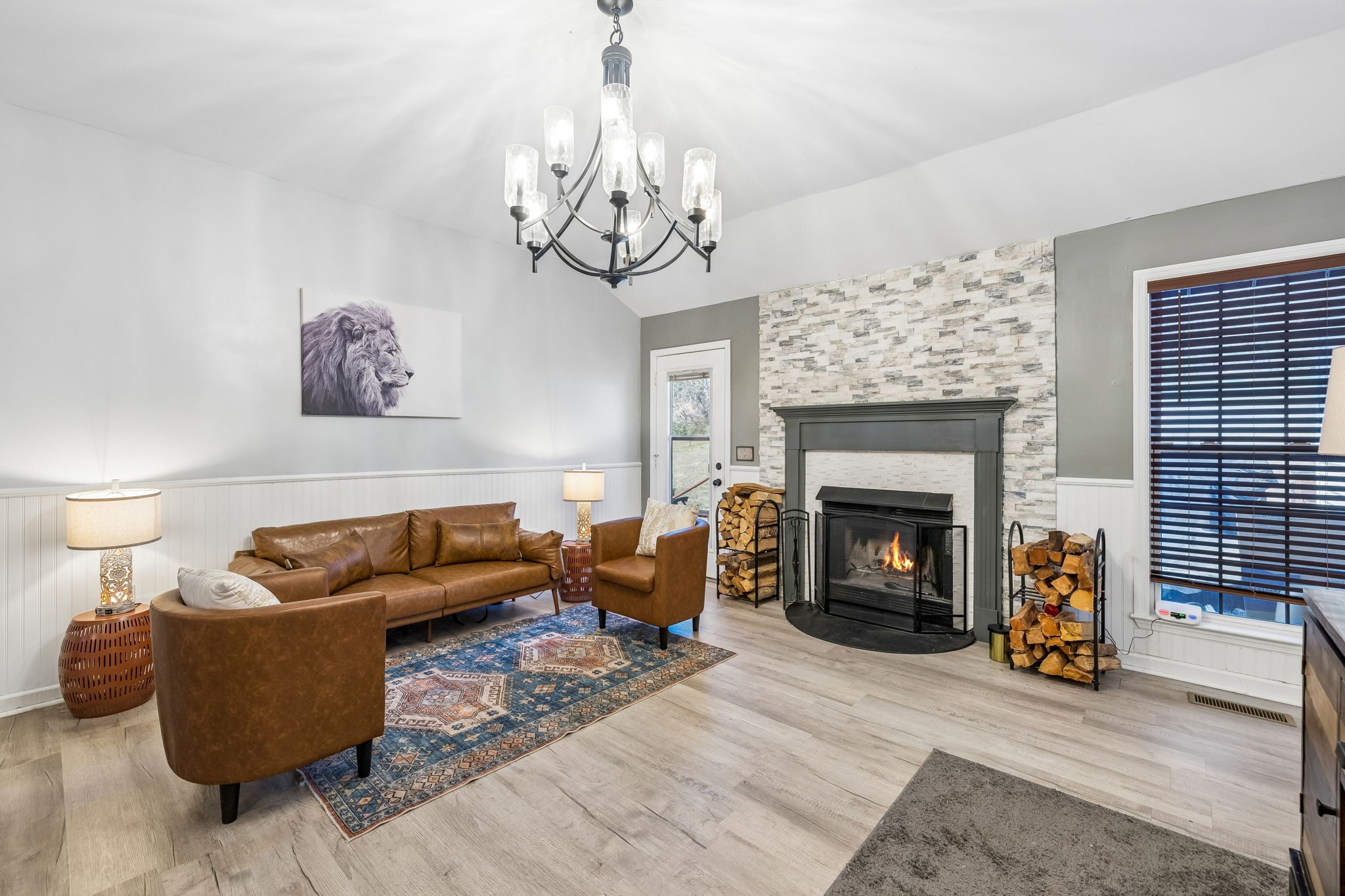 1245 Cliff Amos Road Spring Hill, TN 37174 - Photo 13 of 41 a living room with furniture and a fireplace