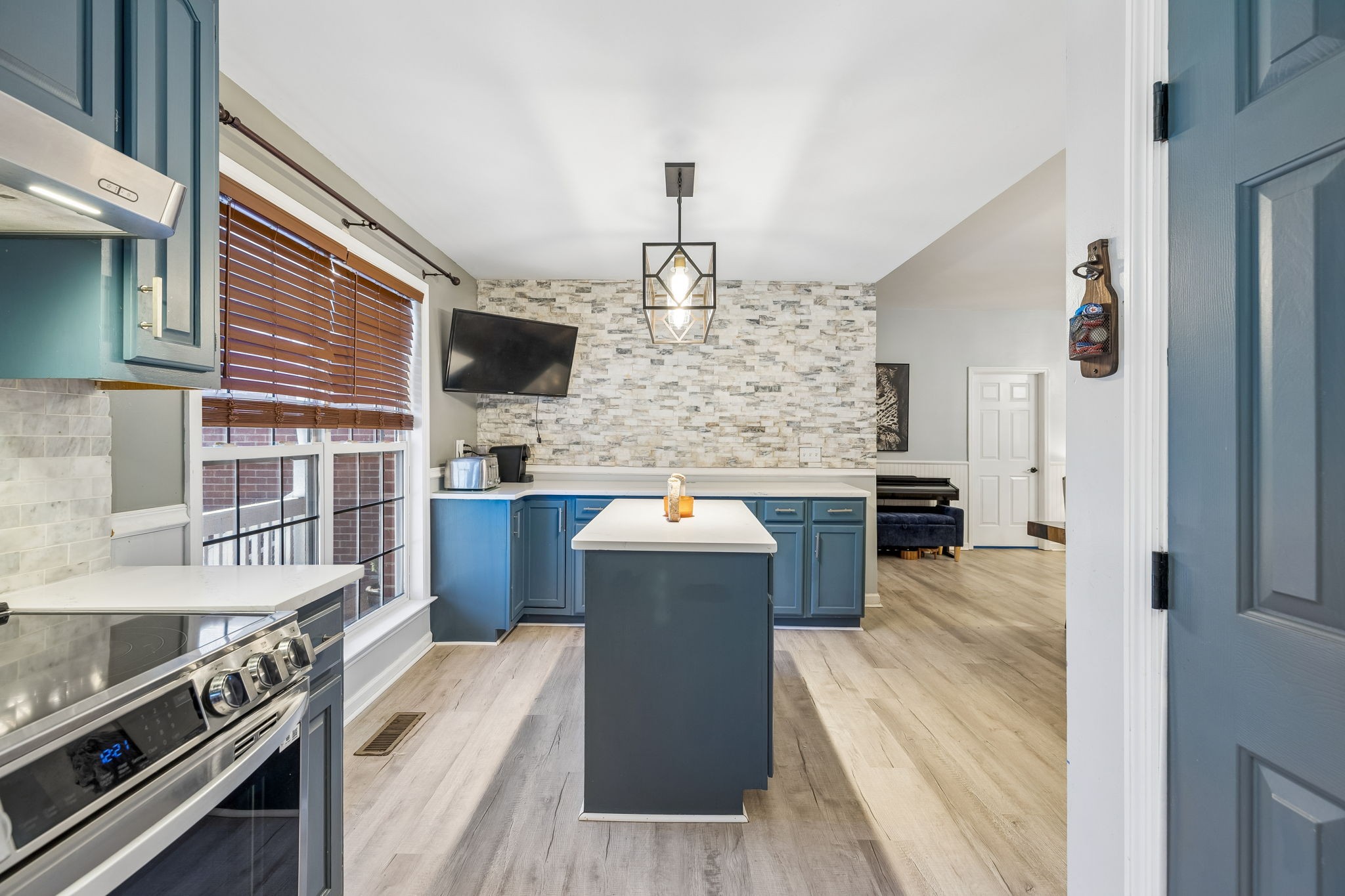 1245 Cliff Amos Road Spring Hill, TN 37174 - Photo 20 of 41 a kitchen with a stove and a sink