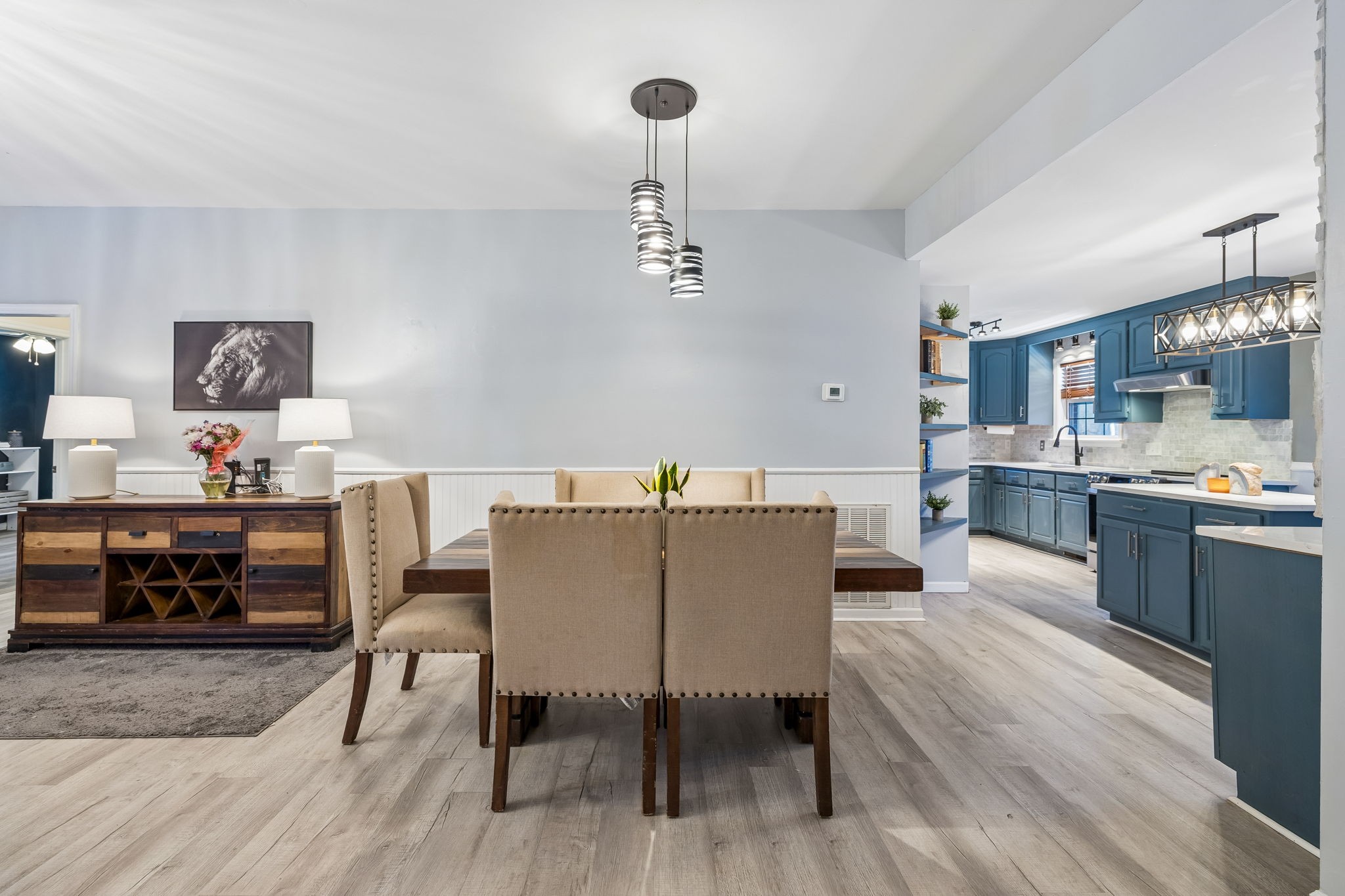 1245 Cliff Amos Road Spring Hill, TN 37174 - Photo 30 of 41 a view of a dining room with furniture and wooden floor