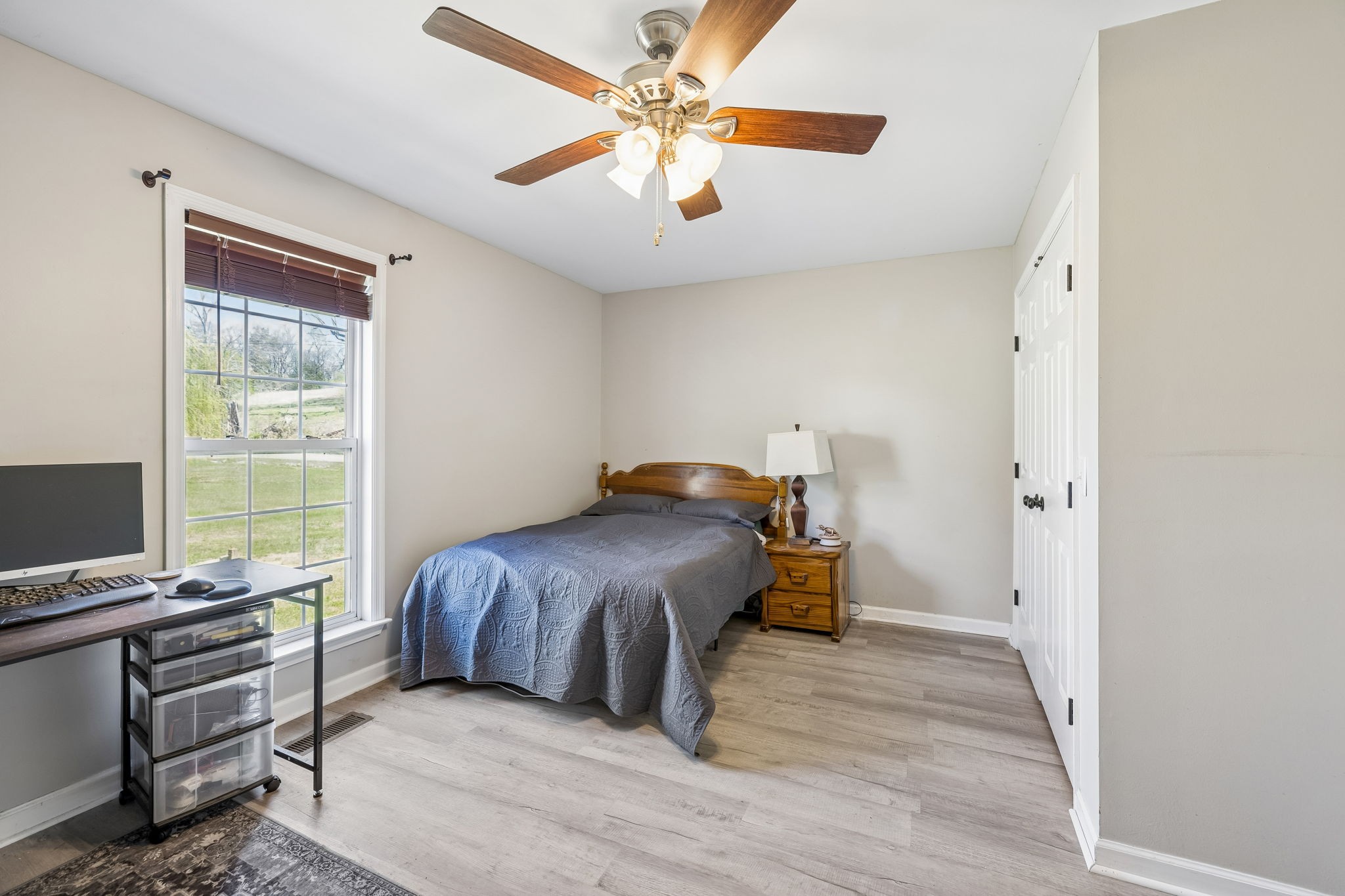 1245 Cliff Amos Road Spring Hill, TN 37174 - Photo 32 of 41 a bedroom with a bed and a window