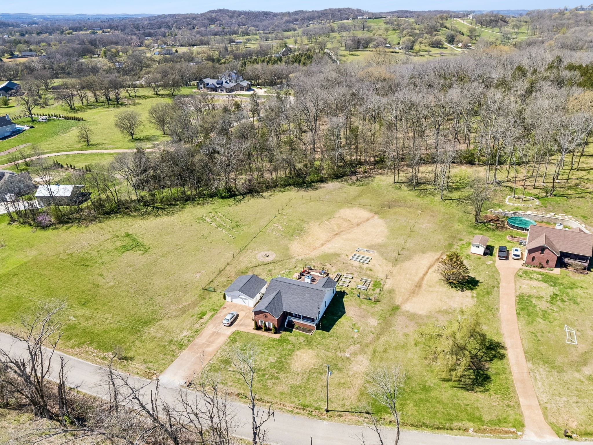 1245 Cliff Amos Road Spring Hill, TN 37174 - Photo 41 of 41 an aerial view of residential houses with outdoor space