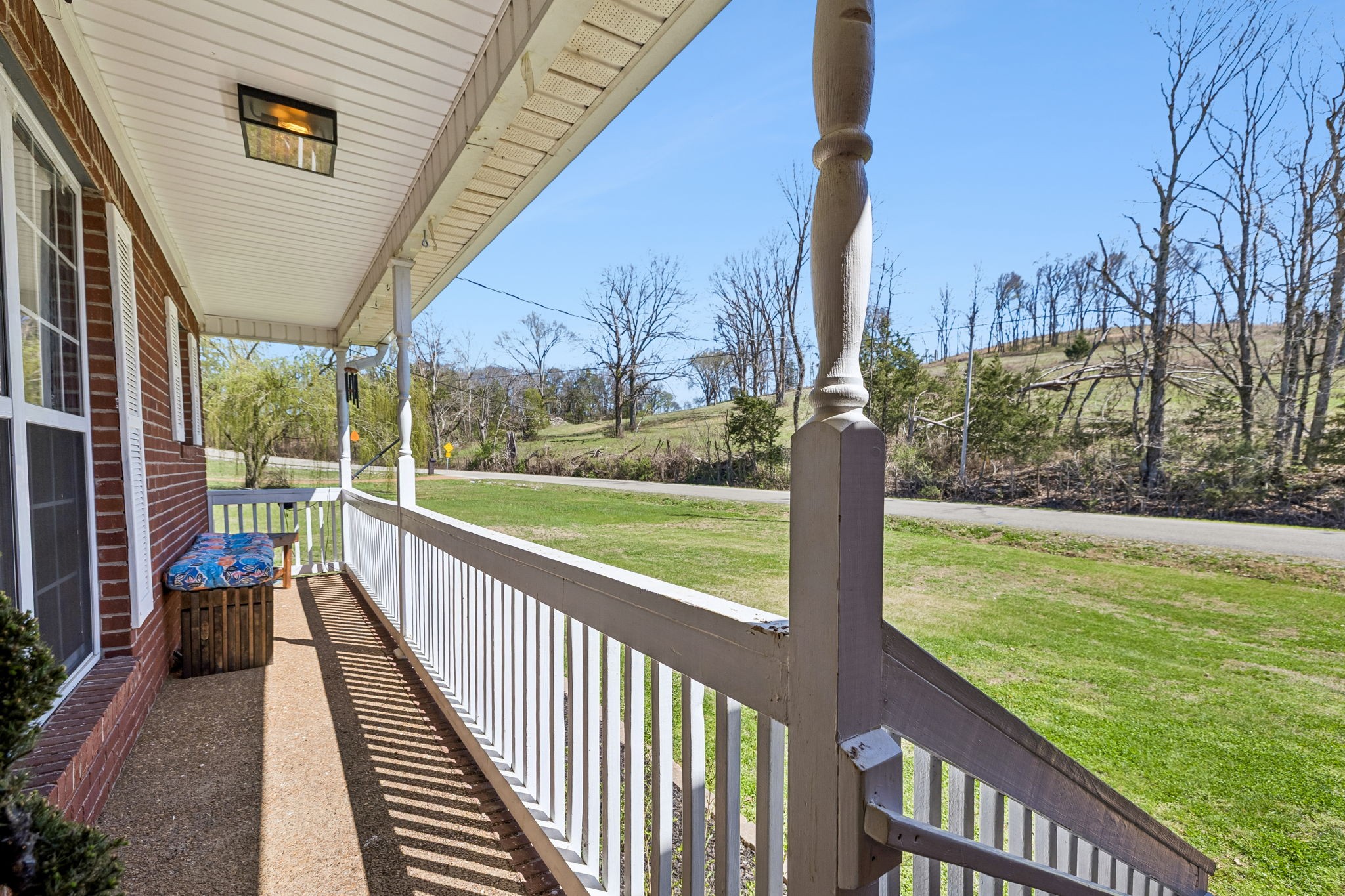 1245 Cliff Amos Road Spring Hill, TN 37174 - Photo 6 of 41 a view of a wooden deck with a yard