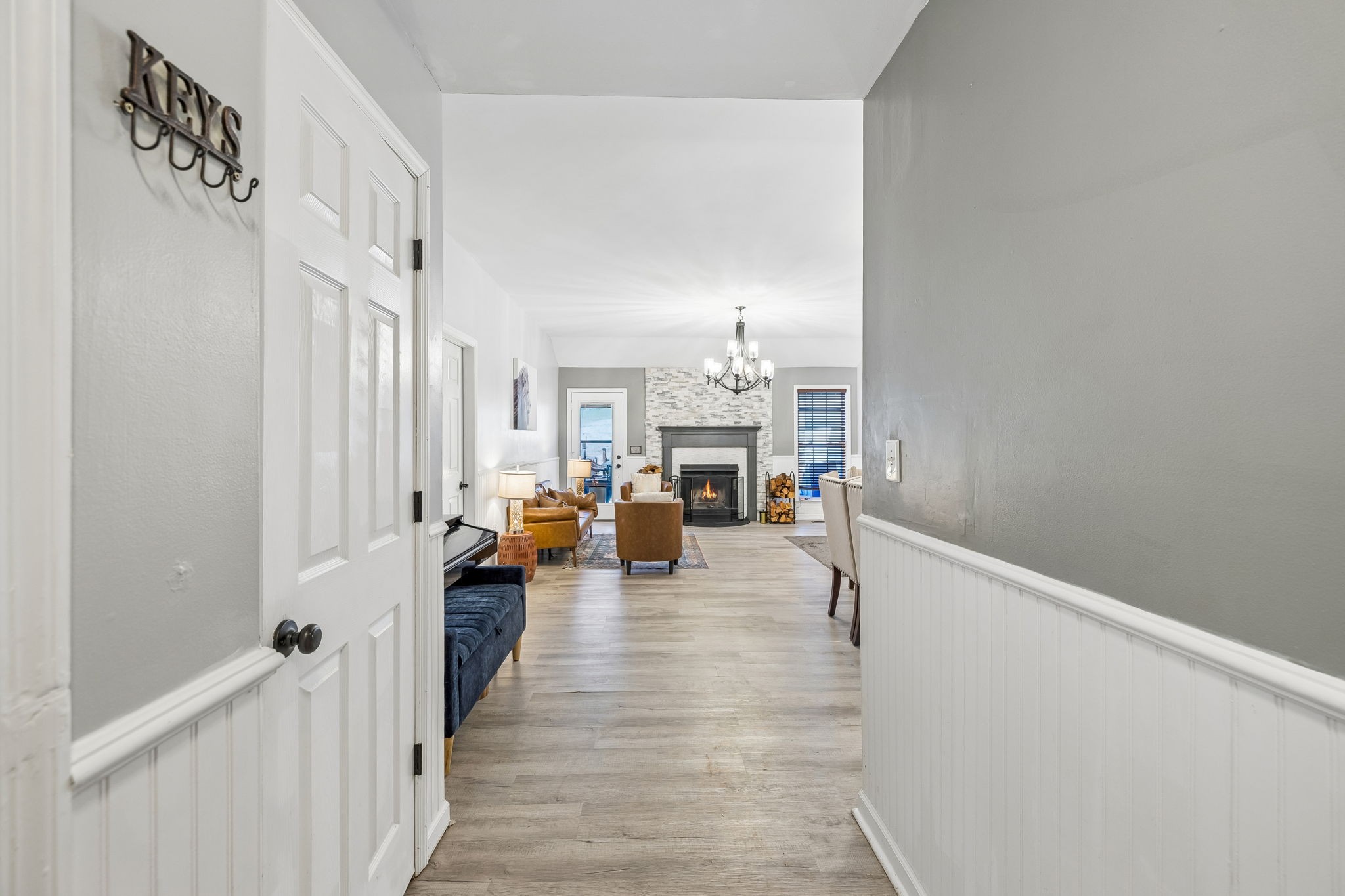 1245 Cliff Amos Road Spring Hill, TN 37174 - Photo 8 of 41 a living room with couches and livingroom view with wooden floor