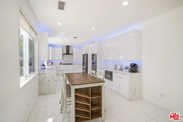 a view of entryway with stairs