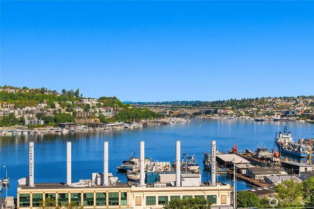 a view of a lake with building in front of it