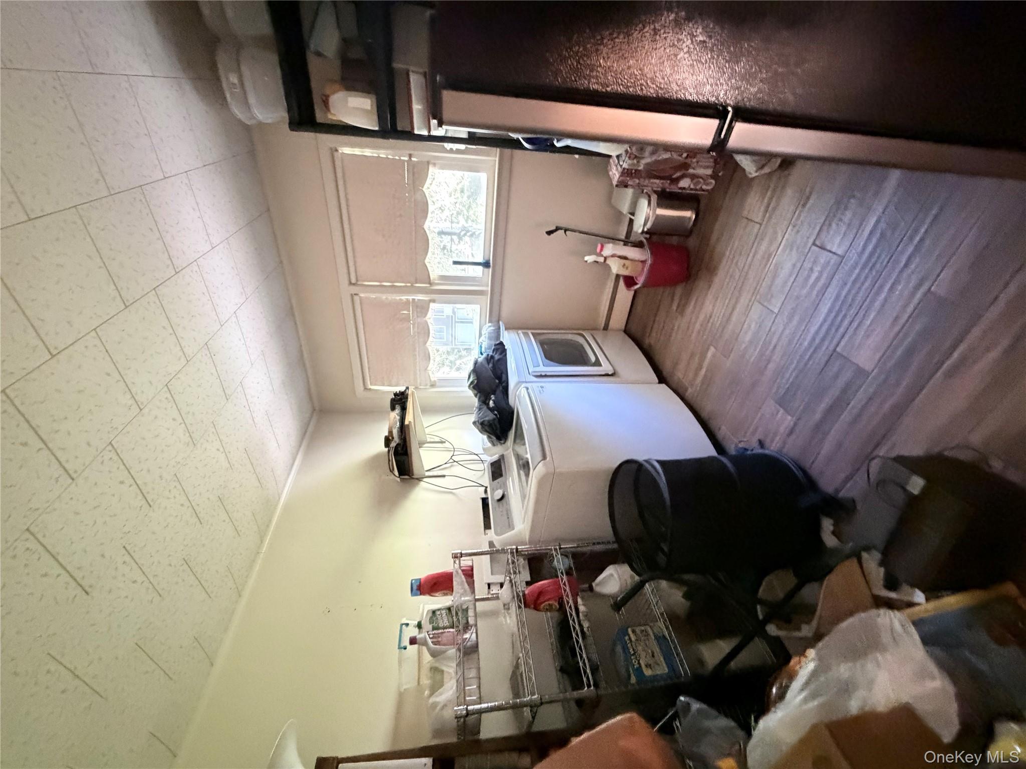 421 Nelson Road Monroe, NY 10950 - Photo 12 of 28 a kitchen with a sink and cabinets