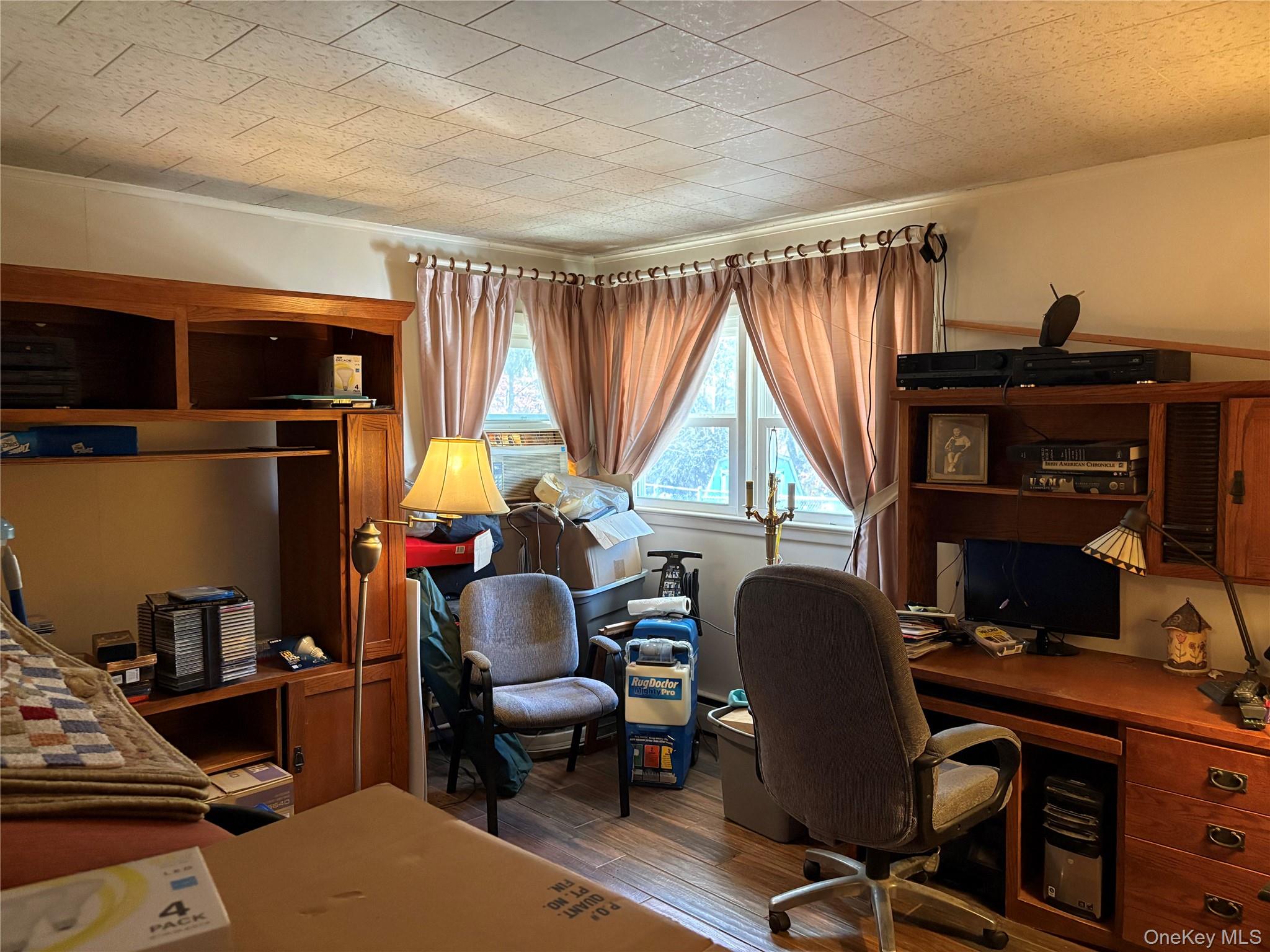 421 Nelson Road Monroe, NY 10950 - Photo 17 of 28 a view of a workspace with furniture and a window