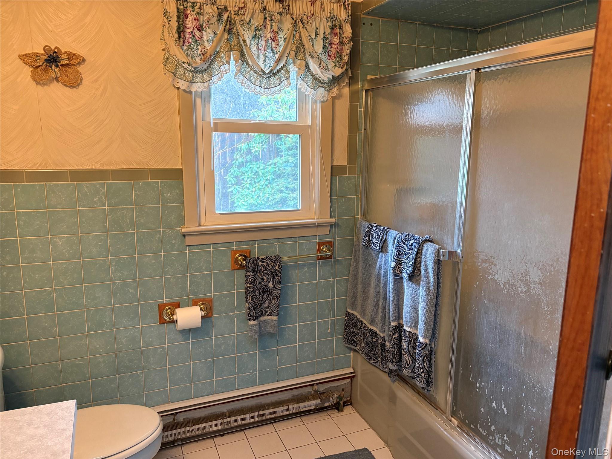 421 Nelson Road Monroe, NY 10950 - Photo 19 of 28 a bathroom with a shower and a toilet