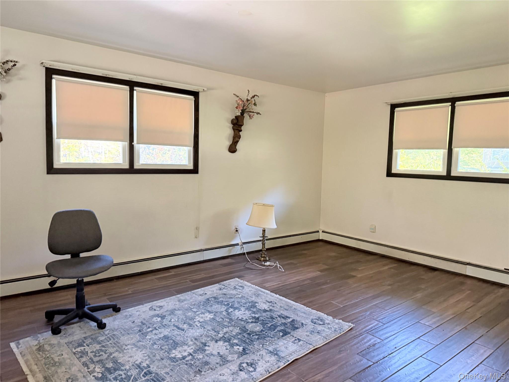 421 Nelson Road Monroe, NY 10950 - Photo 26 of 28 a view of a workspace with furniture and a window