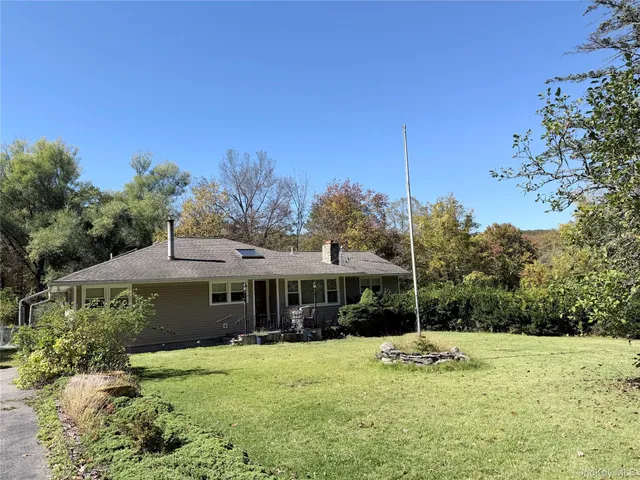 a kitchen with a dining table and chairs