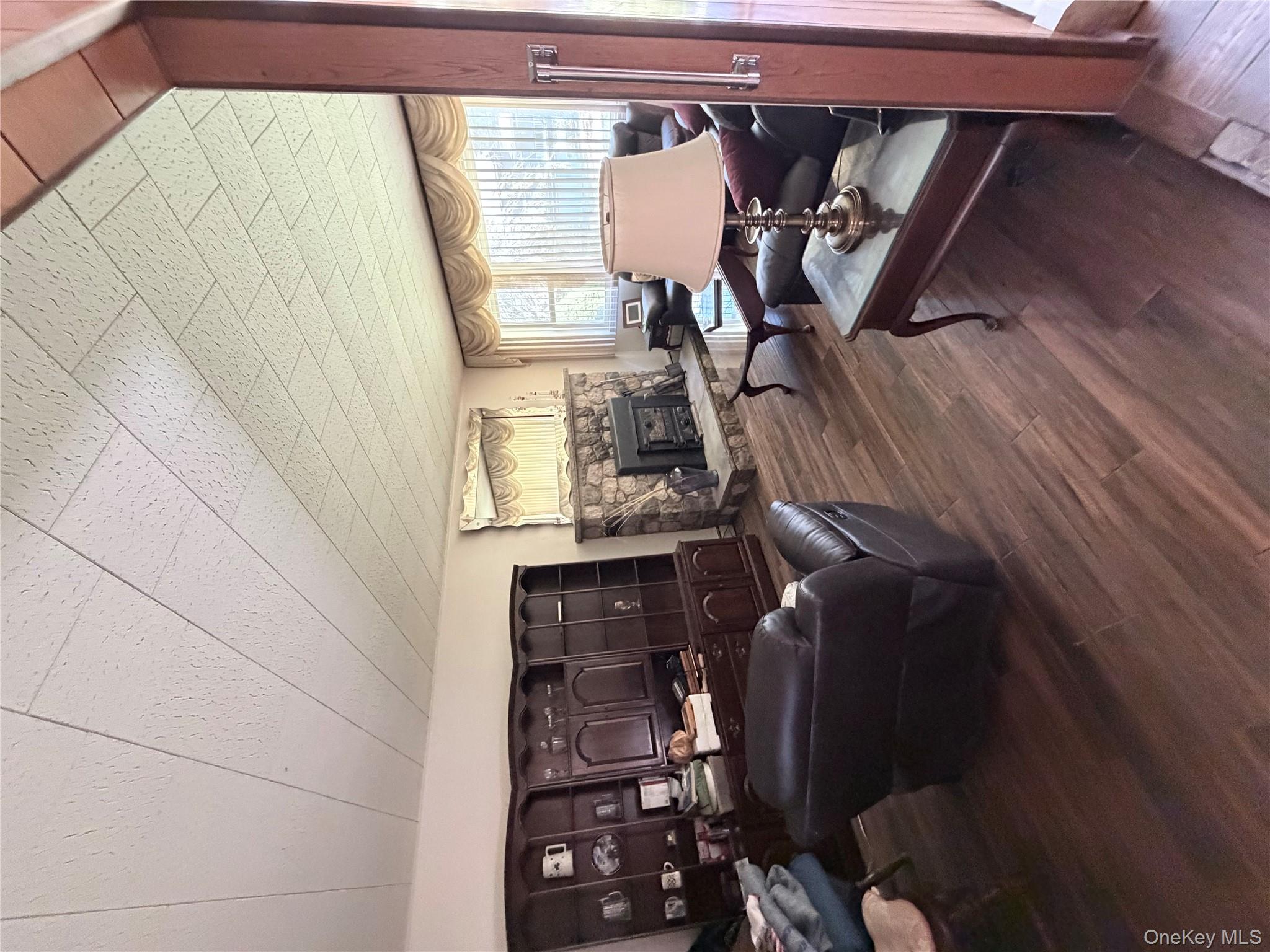 421 Nelson Road Monroe, NY 10950 - Photo 5 of 28 a living room with furniture and a couch