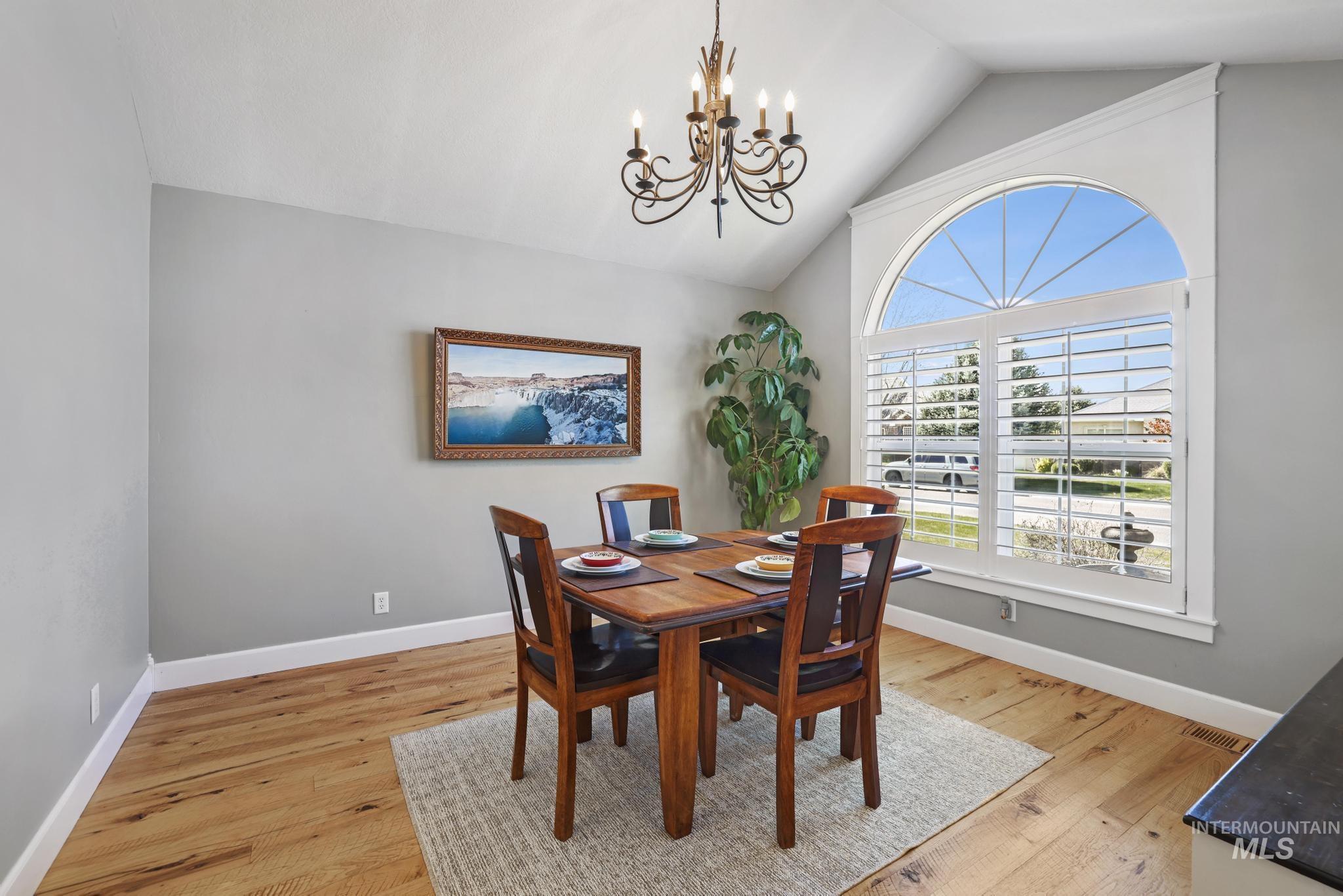 1111 Cole Street Kimberly, ID 83341 - Photo 15 of 46 Dining area with light wood-style flooring and hanging lights
