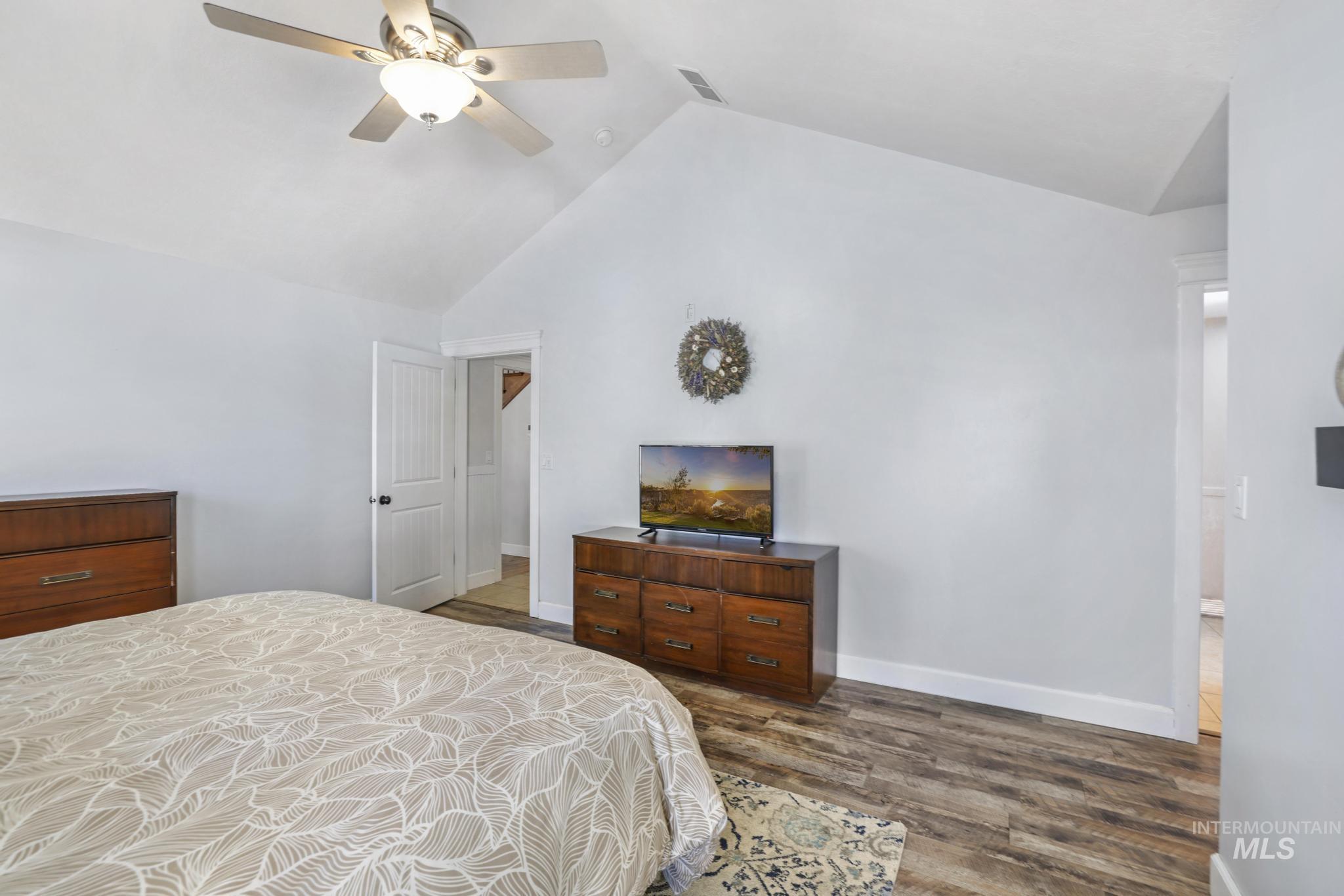 1111 Cole Street Kimberly, ID 83341 - Photo 20 of 46 Bedroom featuring dark wood-style flooring and ceiling fan