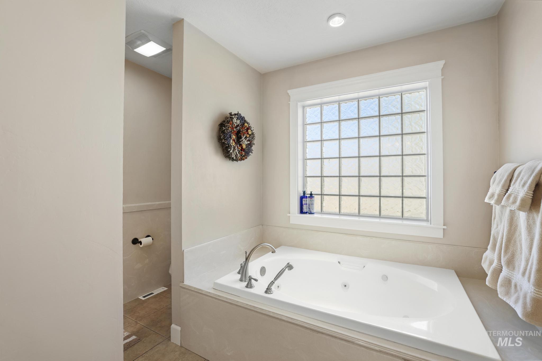 1111 Cole Street Kimberly, ID 83341 - Photo 22 of 46 Full bathroom with a bath and light tile patterned flooring
