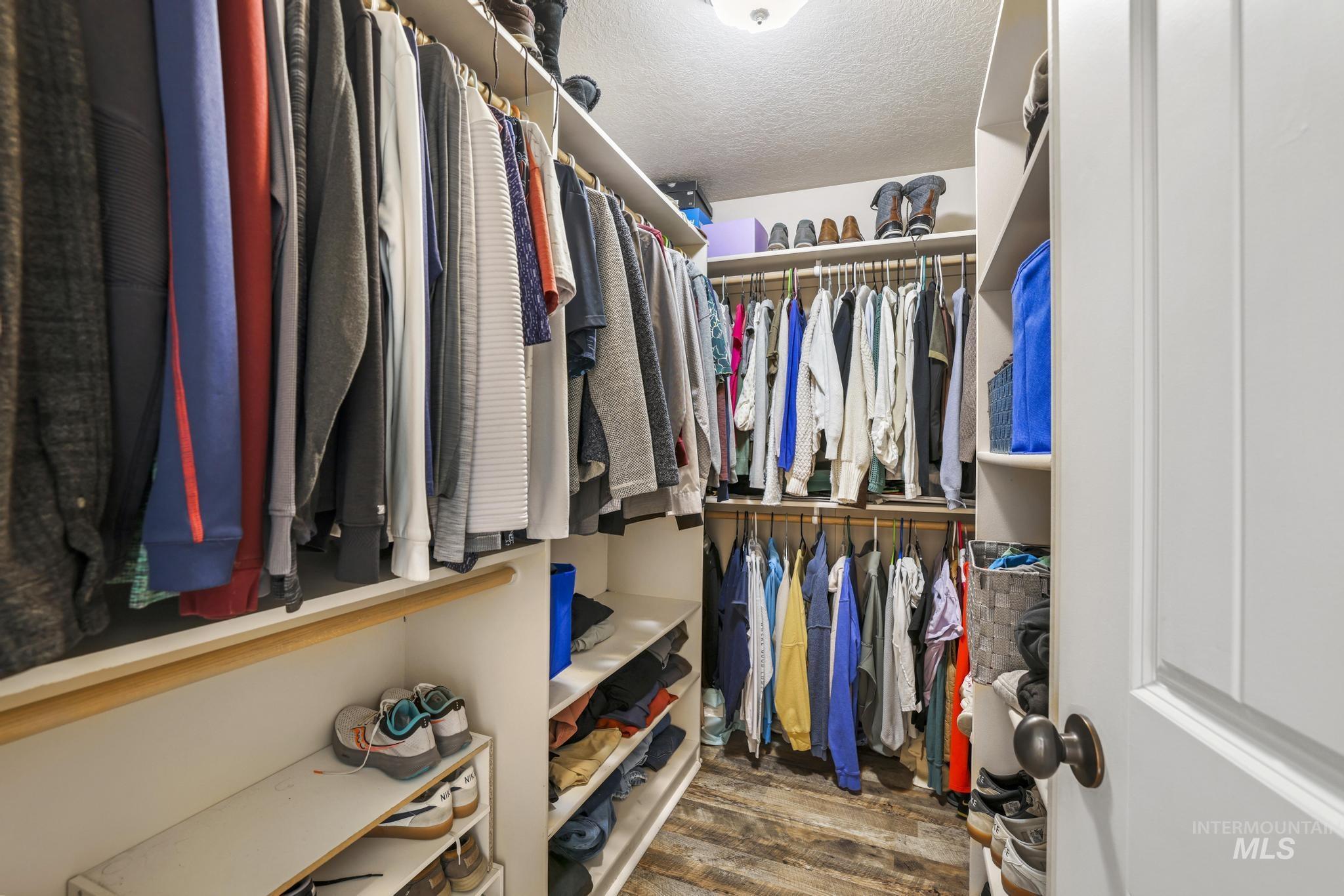 1111 Cole Street Kimberly, ID 83341 - Photo 23 of 46 Walk in closet featuring dark wood finished floors